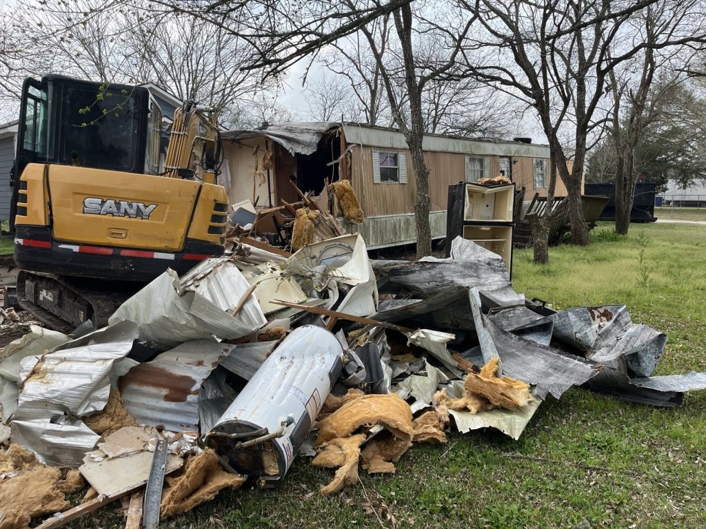 Mobile home demolition in progress