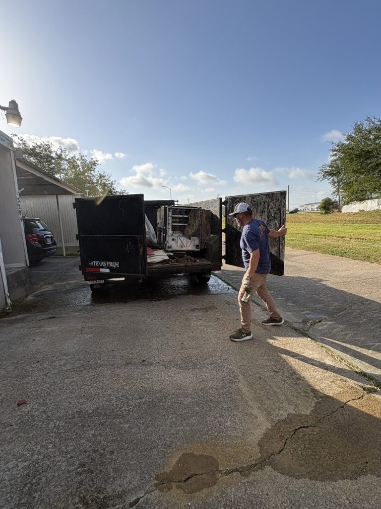 Swinging open the dump trailer barn doors for loading